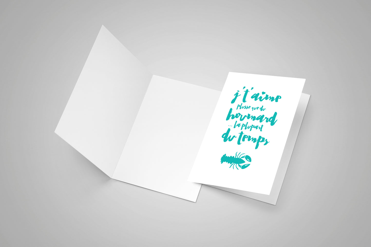 A blank card and second card with an Acadian saying about lobster.