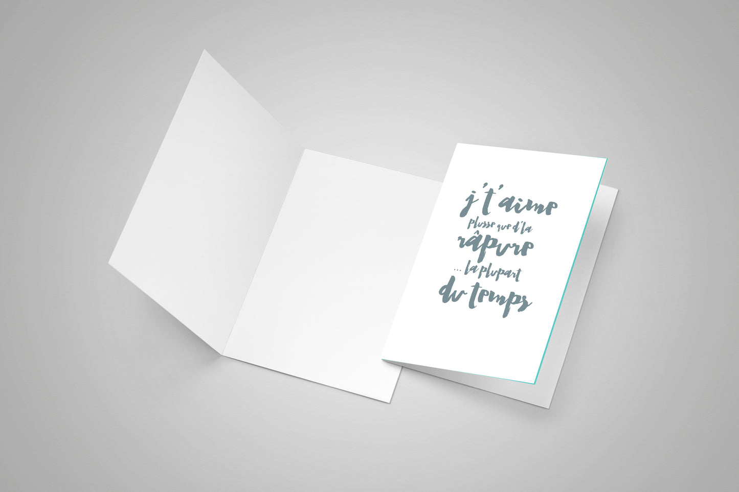 A blank greeting card and a second card with Acadian print about râpure / rappie pie.
