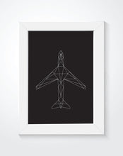 A geometric art illustration of an aircraft in a white framed on the wall.