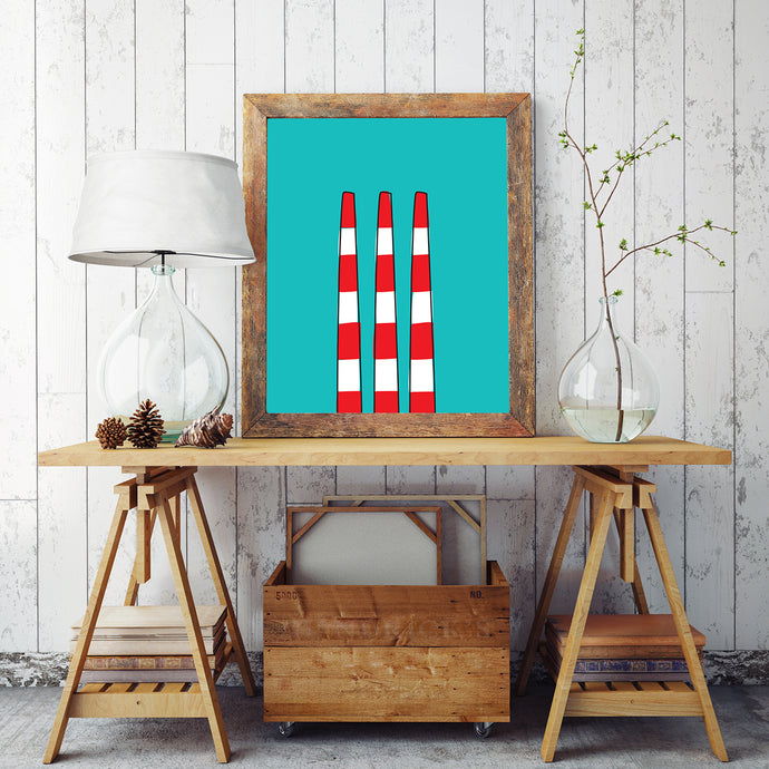 The Halifax/Dartmouth smokestack illustration in a frame on a table.